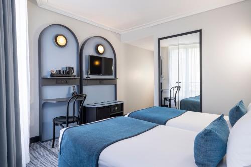 Habitación Doble Confort - 2 camas del hotel De France Gare de Lyon Bastille. Foto 3