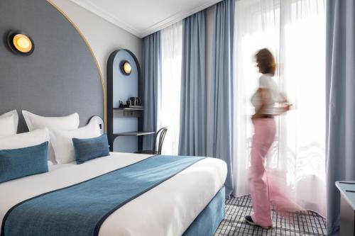 Habitación Doble Confort del hotel De France Gare de Lyon Bastille. Foto 4