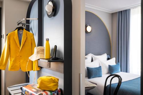 Habitación Triple acogedora del hotel De France Gare de Lyon Bastille. Foto 4