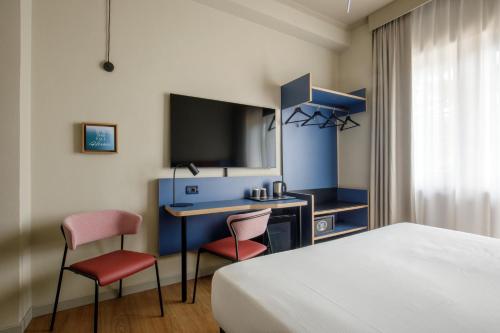 Habitación Estándar - Cama extragrande del hotel Best Western Globus. Foto 1