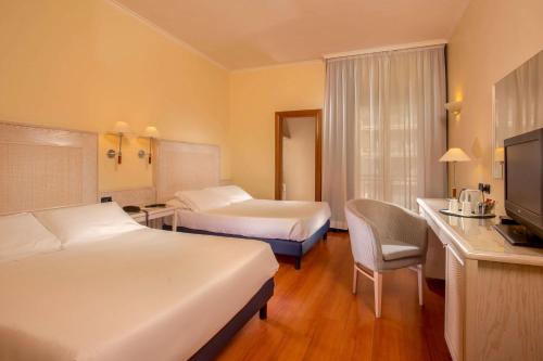 Habitación Cuádruple del hotel Best Western Globus. Foto 2
