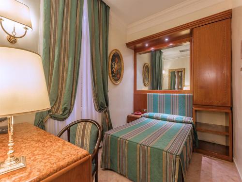 Habitación Doble Económica - 1 o 2 camas del hotel Raeli Luce. Foto 13