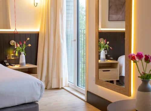 Superior Triple Classic del hotel H10 London Waterloo. Foto 9