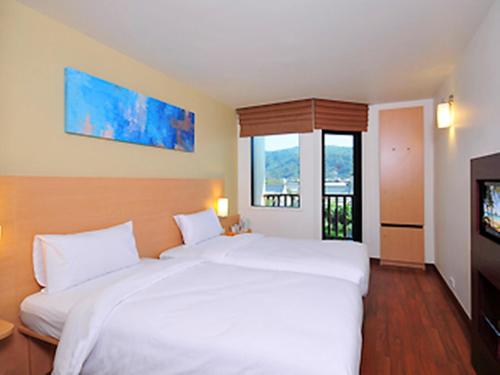 Habitación Doble Estándar - 2 camas del hotel Ibis Phuket Kata - Sha Extra Plus. Foto 1