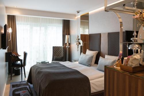 Habitación Superior con cama extragrande del hotel Tivoli. Foto 3
