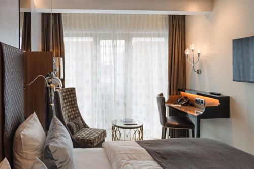 Habitación Superior con cama extragrande del hotel Tivoli. Foto 4