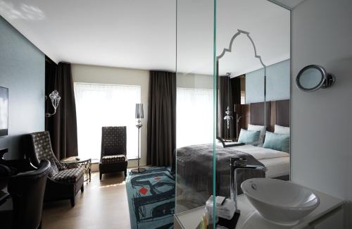 Habitación Deluxe con cama extragrande del hotel Tivoli. Foto 2