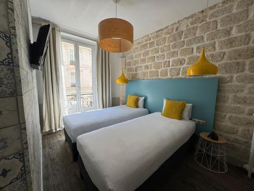 Habitación Doble - 2 camas del hotel Le Régent Montmartre By Hiphophostels