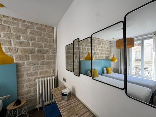 Habitación Doble - 2 camas del hotel Le Régent Montmartre By Hiphophostels. Foto 1