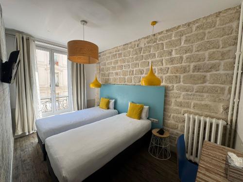 Habitación Doble - 2 camas del hotel Le Régent Montmartre By Hiphophostels. Foto 2