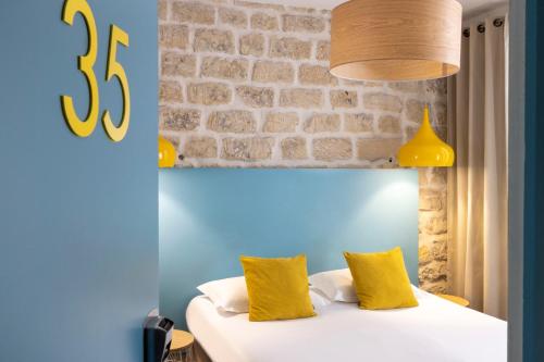 Habitación Doble Clásica del hotel Le Régent Montmartre By Hiphophostels. Foto 1