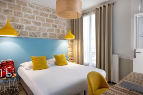 Habitación Doble Clásica del hotel Le Régent Montmartre By Hiphophostels. Foto 2