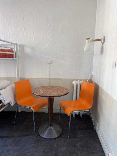 Habitación Doble Económica del hotel Le Régent Montmartre By Hiphophostels. Foto 1