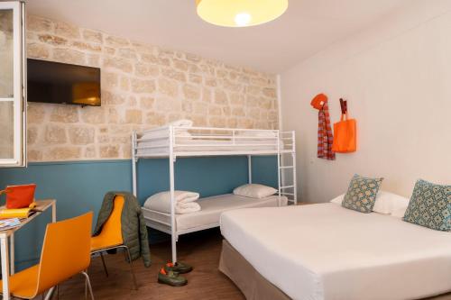 Habitación cuádruple del hotel Le Régent Montmartre By Hiphophostels