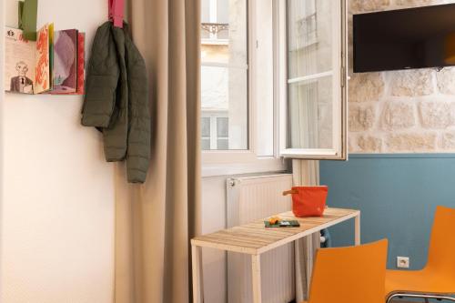 Habitación cuádruple del hotel Le Régent Montmartre By Hiphophostels. Foto 2
