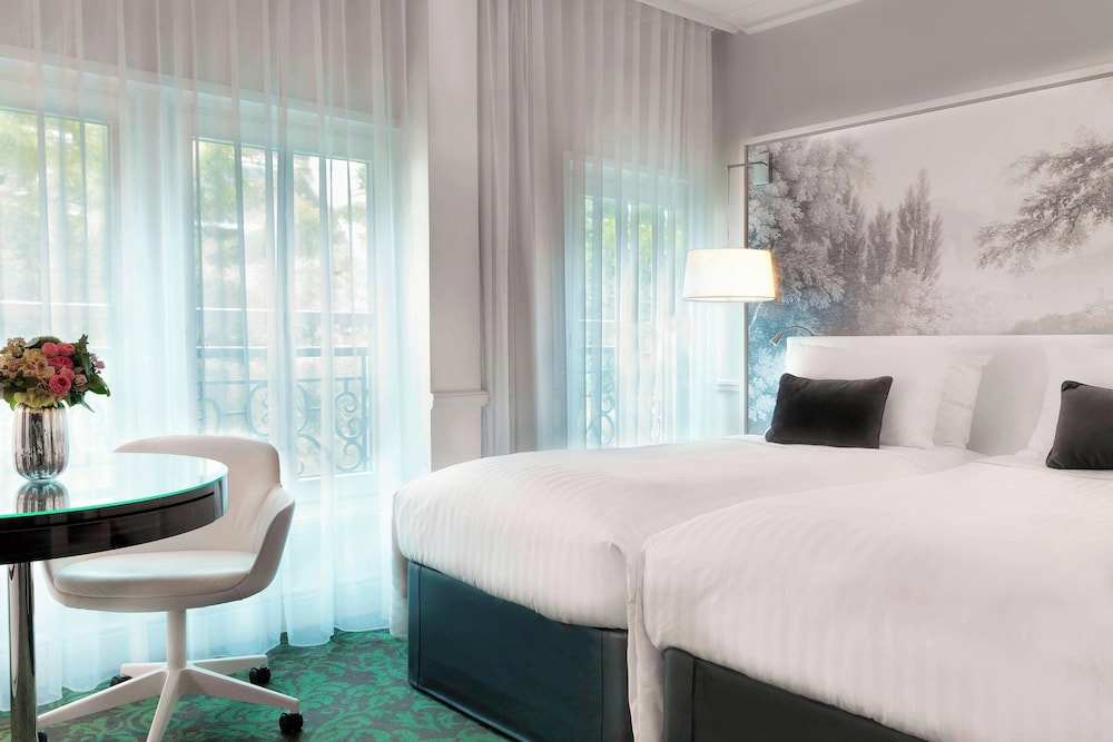 Habitación, 2 camas individuales, vistas al jardín del hotel Renaissance Paris Nobel Tour Eiffel