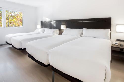 Habitación Cuádruple del hotel B&B Barcelona Rubi
