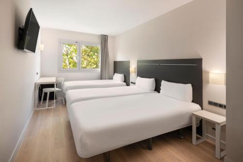 Habitación Triple del hotel B&B Barcelona Rubi