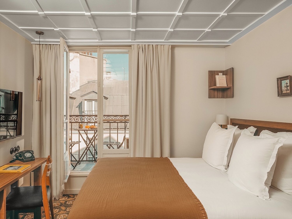 Habitación clásica doble, balcón del hotel Hôtel Le Petit Belloy St Germain. Foto 1