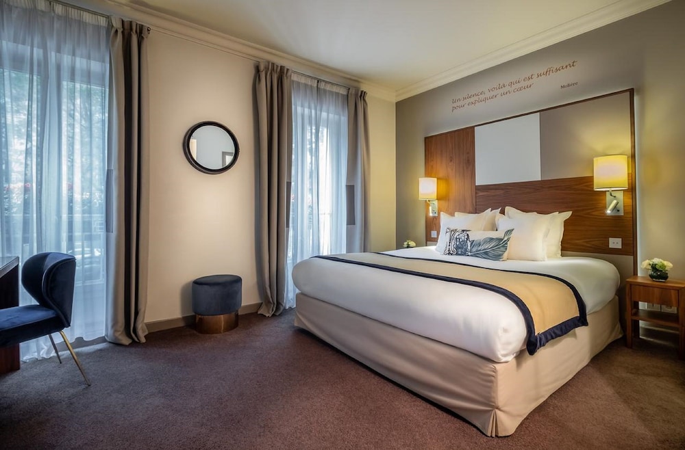 Habitación ejecutiva, terraza del hotel LE TOURVILLE PARIS. Foto 3