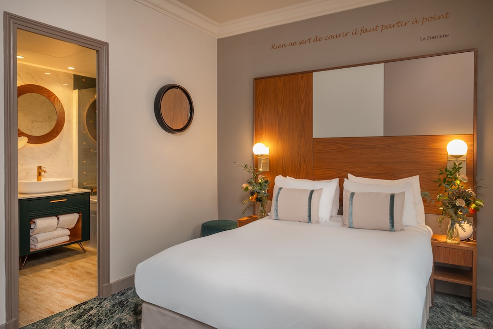 Habitación ejecutiva del hotel LE TOURVILLE PARIS. Foto 8