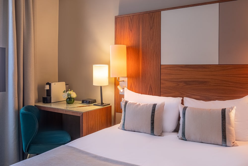 Habitación individual estándar del hotel LE TOURVILLE PARIS. Foto 2