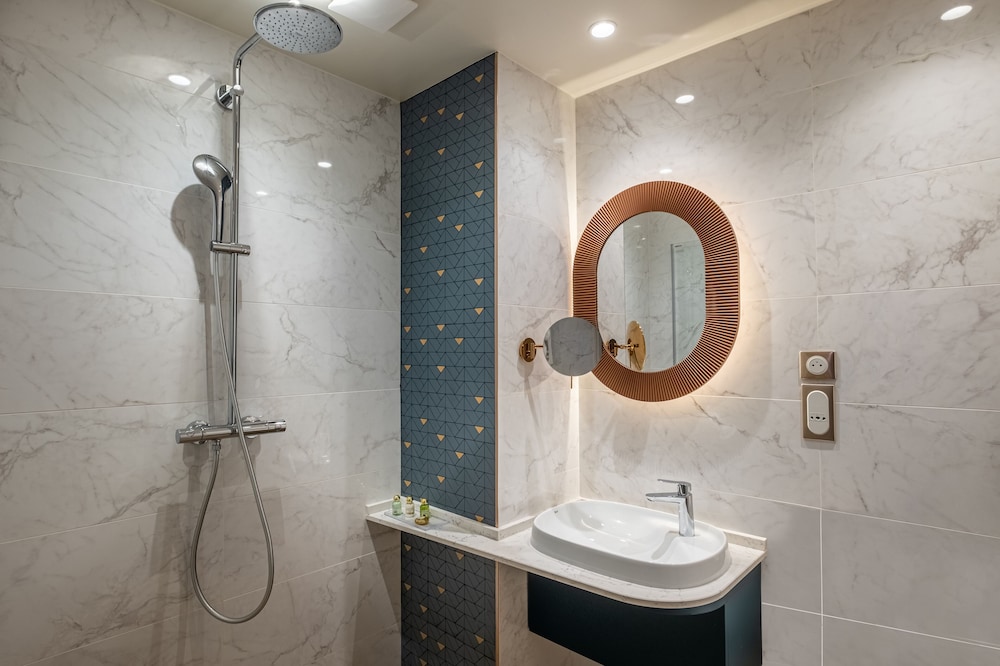 Habitación individual estándar del hotel LE TOURVILLE PARIS. Foto 6