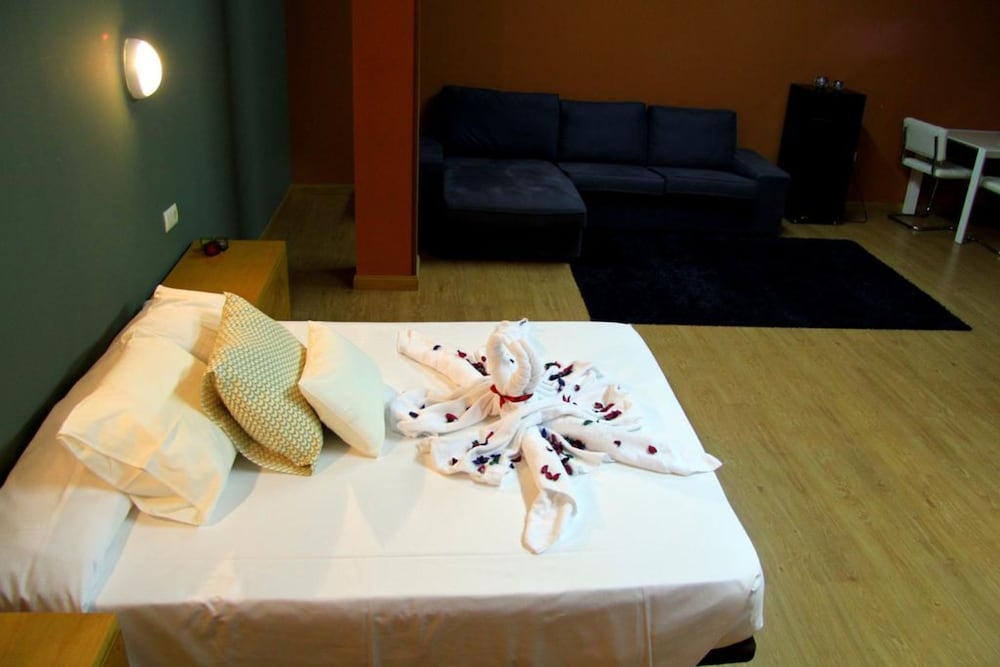 Habitación triple del hotel Ahc Cáceres