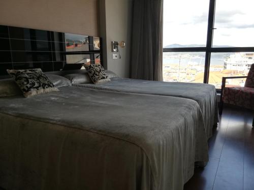 Habitación Doble con vistas al mar - 1 o 2 camas del hotel Silken Axis Vigo. Foto 2