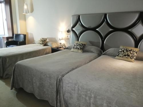 Habitación Doble con cama supletoria del hotel Silken Axis Vigo