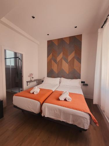 Habitación Doble - 2 camas del hotel Nochela Sevilla. Foto 7