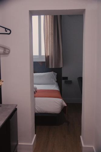 Habitación Individual del hotel Nochela Sevilla. Foto 9