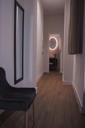 Habitación Doble con patio del hotel Nochela Sevilla. Foto 12