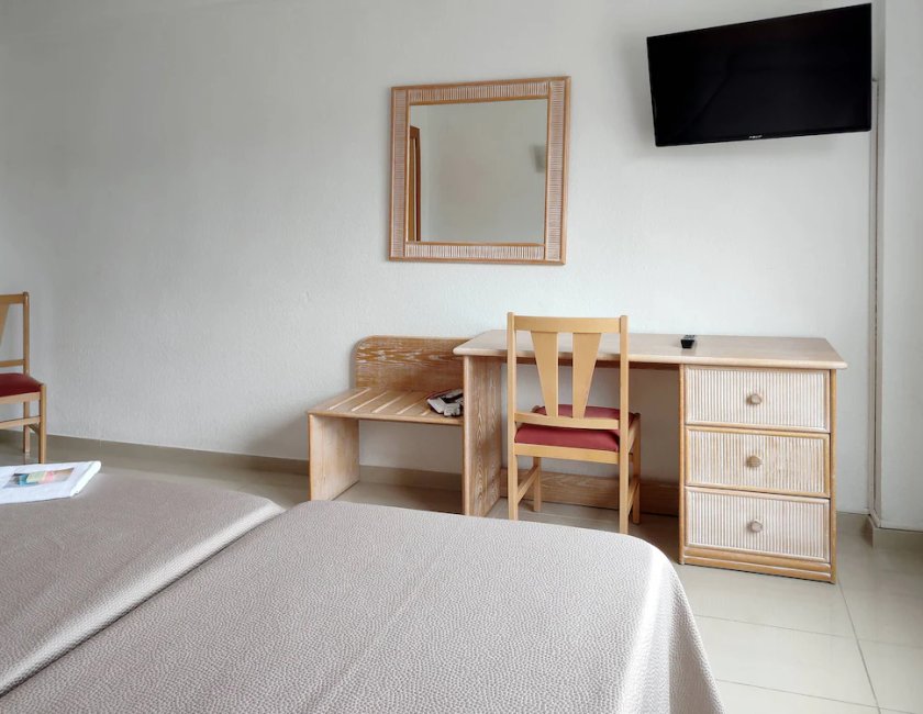 Habitación con 2 camas individuales del hotel Porto. Foto 1