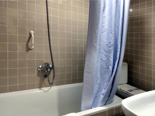 Habitación Triple del hotel Porto