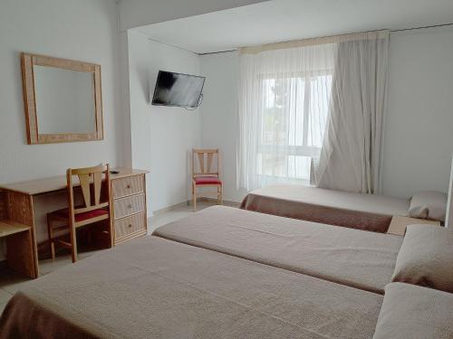 Habitación Triple del hotel Porto. Foto 5