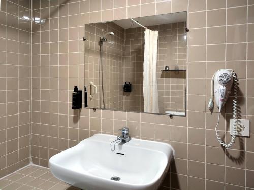 Habitación cuádruple del hotel Porto. Foto 3