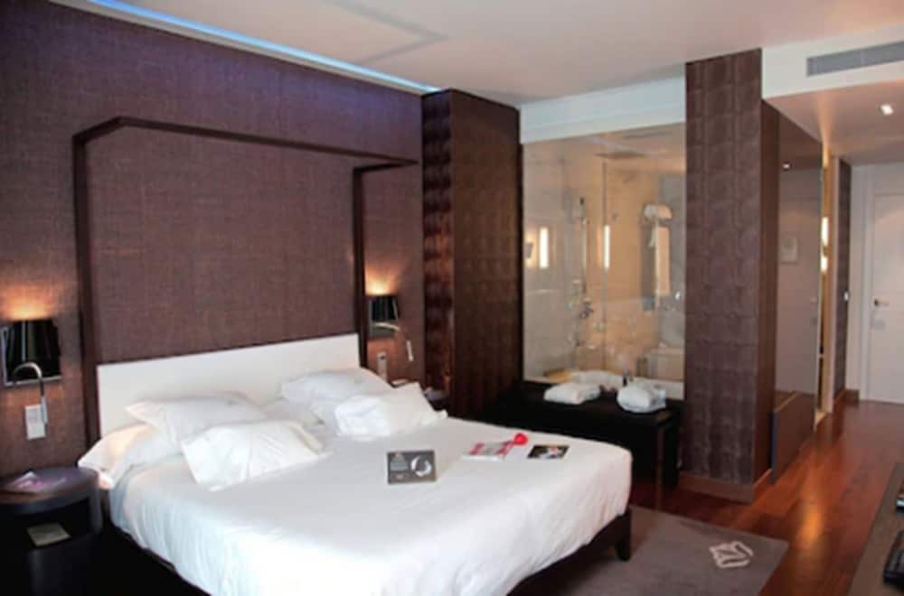 Habitación con 1 cama doble o 2 individuales del hotel Gran Nagari Boutique and Spa. Foto 2