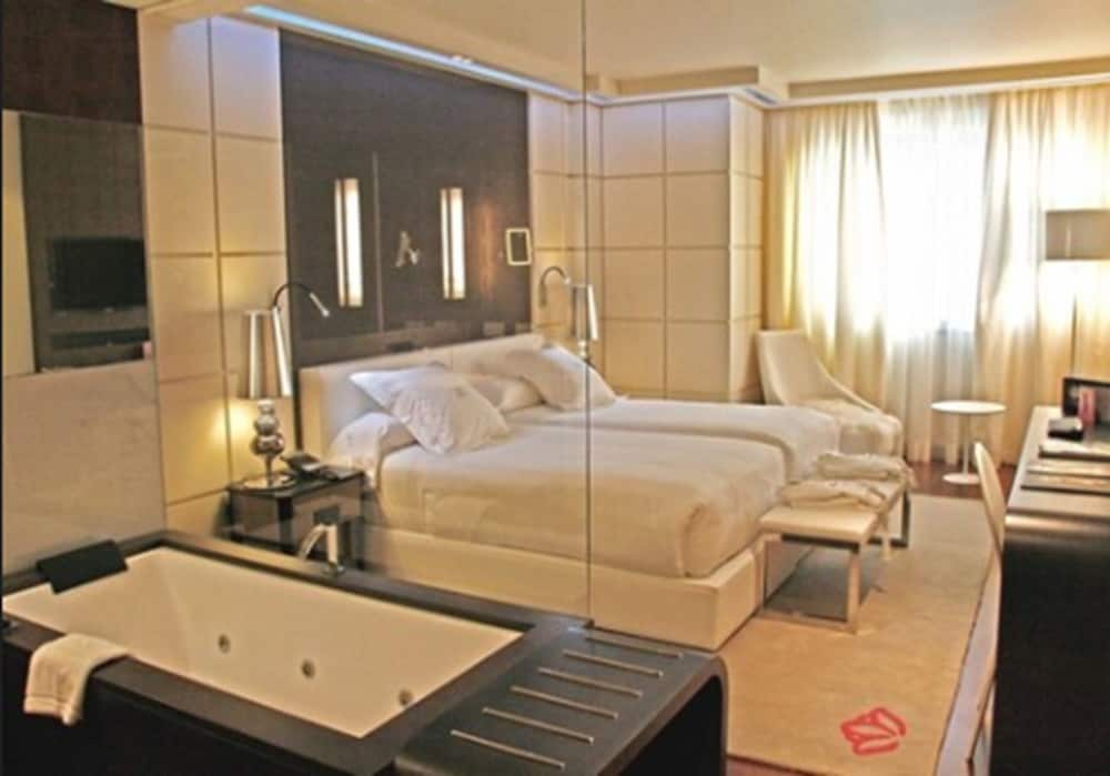 Habitación con 1 cama doble o 2 individuales del hotel Gran Nagari Boutique and Spa. Foto 3