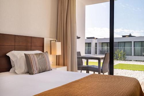 Suite con terraza del hotel Monchique Resort and Spa. Foto 1