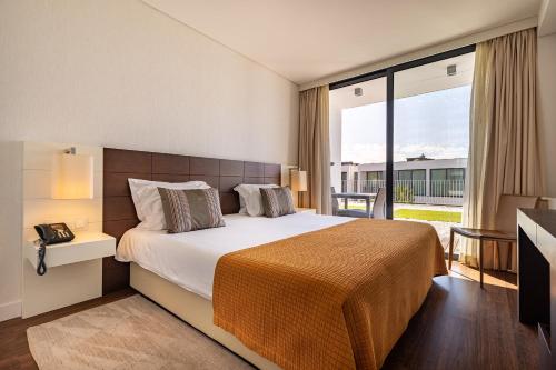 Suite con terraza del hotel Monchique Resort and Spa. Foto 3