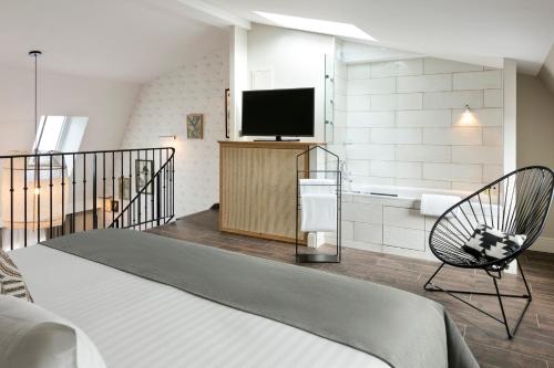 Habitación Cuádruple Dúplex del hotel Royal Madeleine. Foto 2
