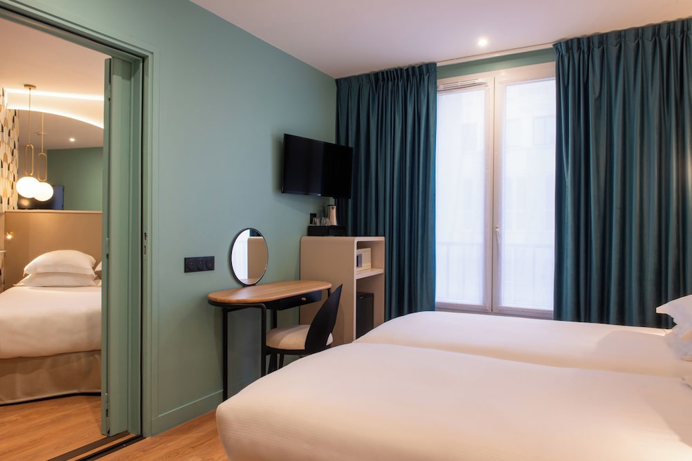 Habitación familiar del hotel Arc Elysees
