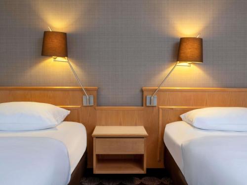 Habitación Doble Clásica - 2 camas del hotel Moevenpick Nuernberg Airport. Foto 5