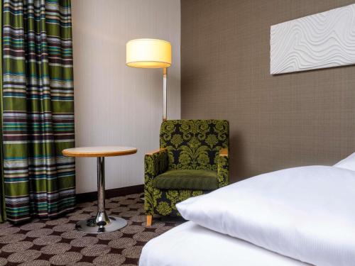 Habitación Superior con cama extragrande del hotel Moevenpick Nuernberg Airport