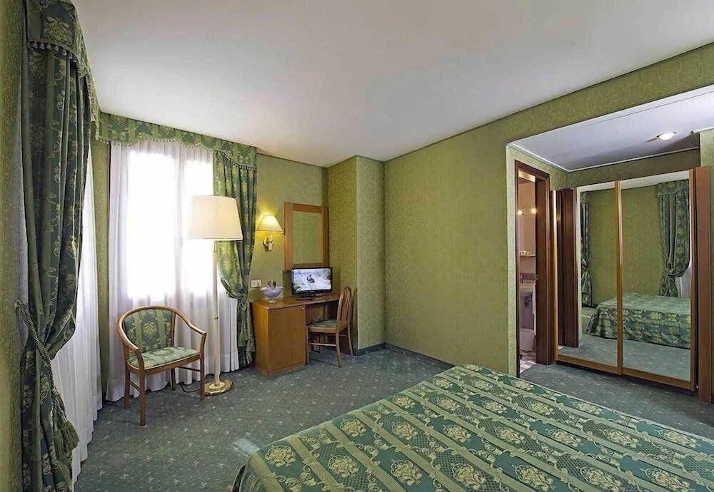 Habitación cuádruple del hotel Nazionale. Foto 2