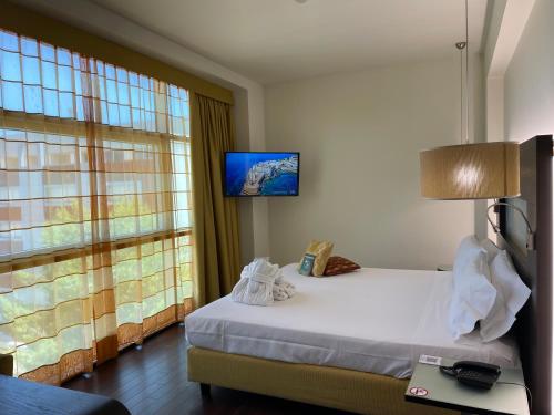 Habitación Doble Deluxe del hotel Mercure Siracusa Prometeo. Foto 3