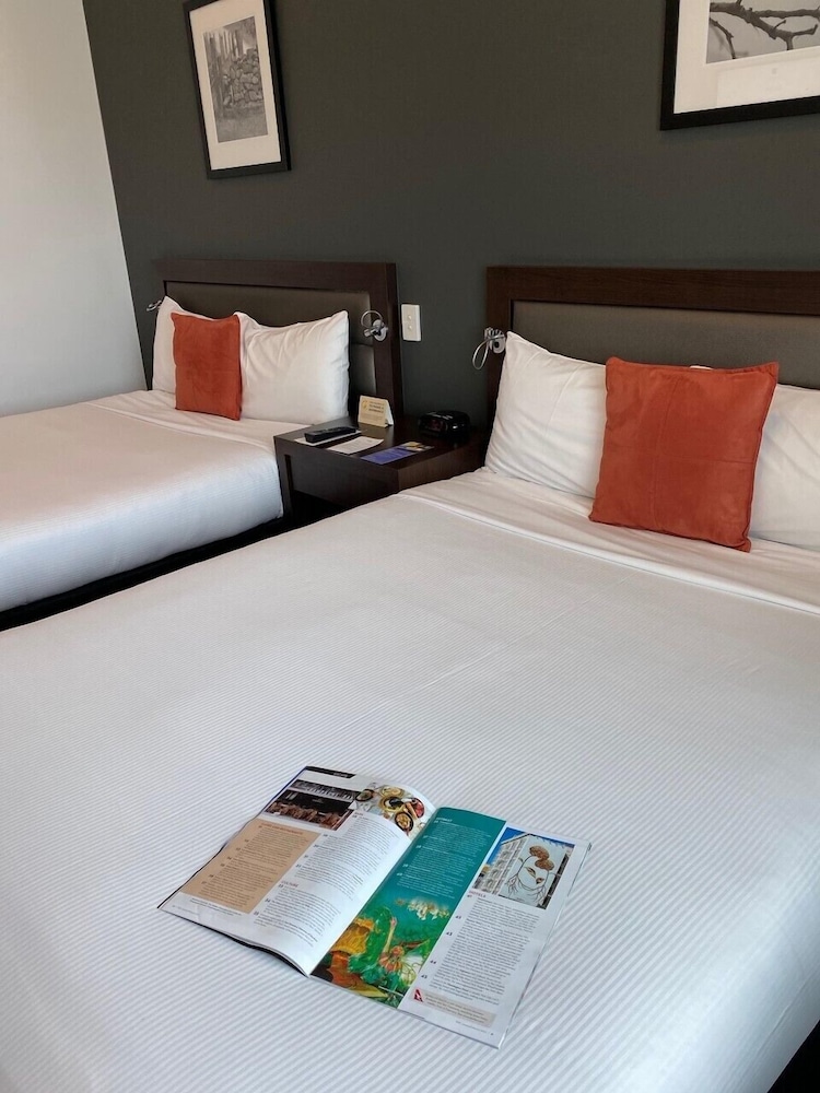 Habitación Premier con 2 camas individuales del hotel Novotel Brisbane Airport. Foto 1