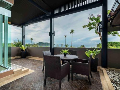 Suite con tres dormitorios y vistas al océano del hotel Pullman Phuket Panwa Beach Resort - Sha Plus. Foto 9
