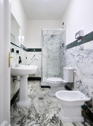 Habitación Cuádruple del hotel Leon D´oro. Foto 1